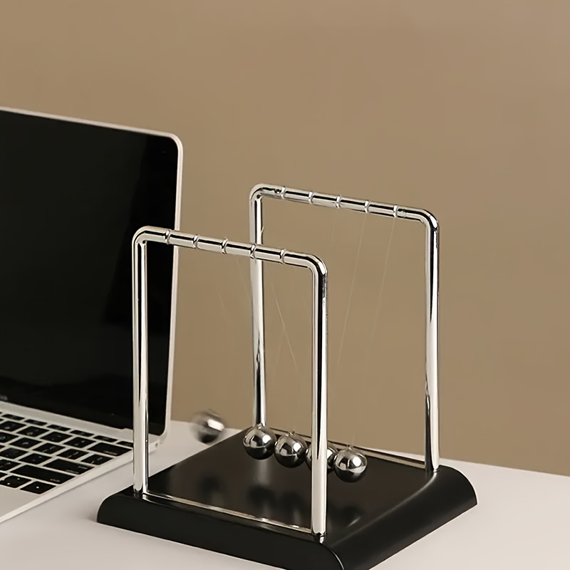Newton's Cradle, made of durable PP material, is both a desktop physics demonstration pendulum and a stress-relieving decorative piece for offices and homes, ideal as a creative gift. - Image 3