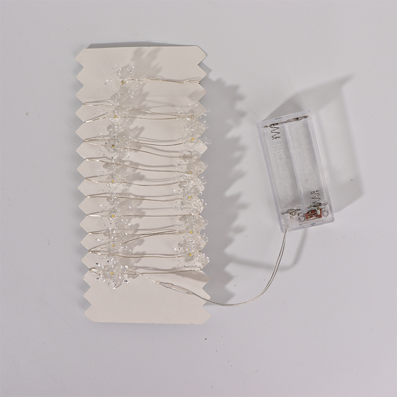 2m 20-LED Christmas Snowflake String Lights, Warm White, Battery Powered (2 x AA Batteries Required) - Image 1