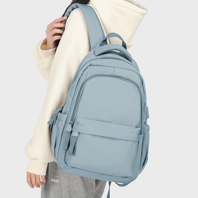 14-inch Waterproof Lightweight Laptop Backpack for School and University, Light Blue - Image 1