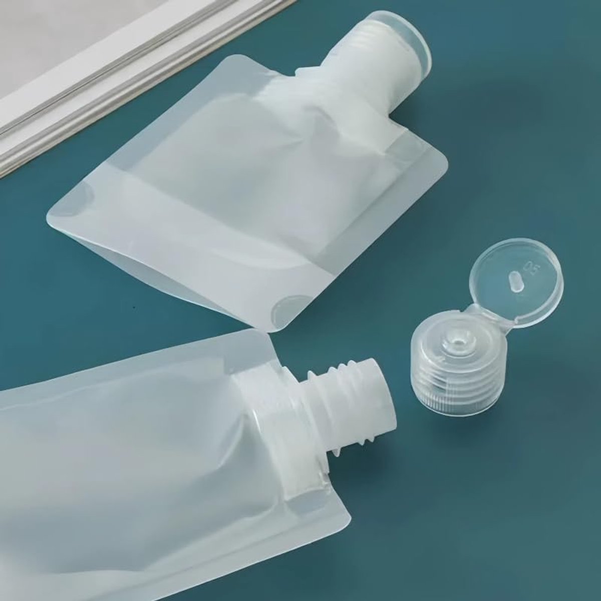 20 pieces - Travel-size Toiletries Bag - Travel Toiletries Containers - travel containers - refillable travel bottles - for cosmetics, lotions, shower gels, shampoos, travel essentials - 100 ml, 50 ml, 30 ml - with portable funnel - transparent - Image 4