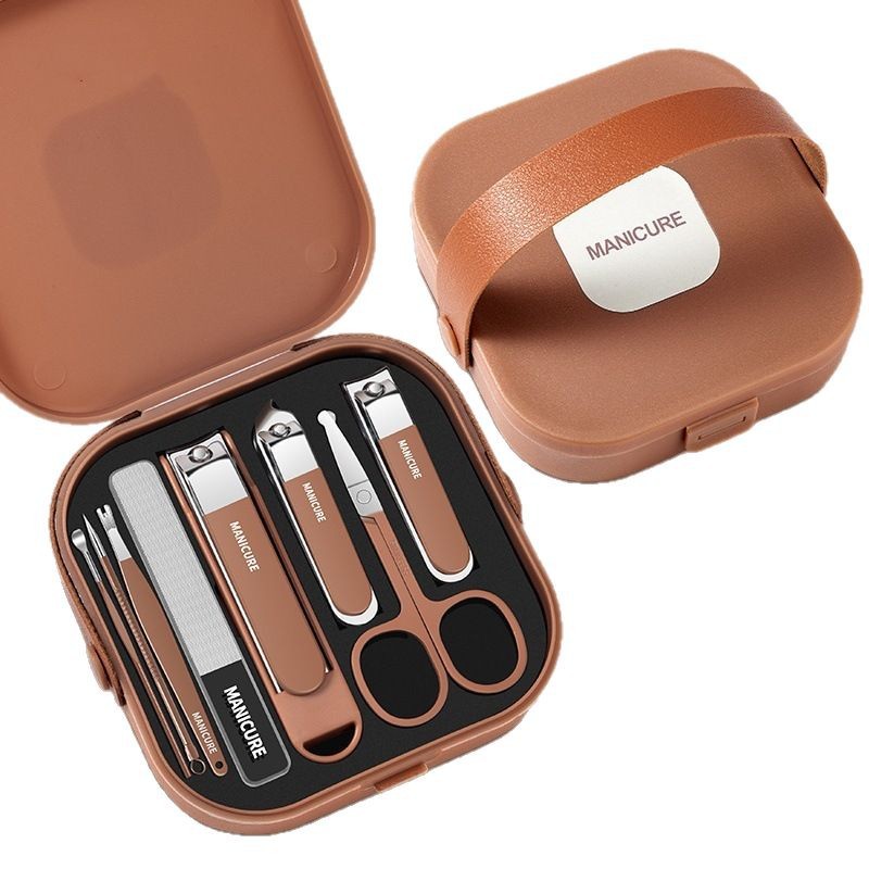Manicure set - Pedicure set - Nail clippers - Nail scissors - Nail file - Tweezers - Stainless steel - Luxury case - Travel size - Nail cutting - Cuticle pusher - Nail styling - Hands and feet - Compact - Beige - 7 pieces - Image 4