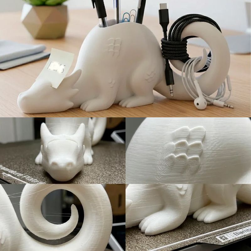 A 3D-printed dragon-shaped desktop organizer adds a touch of fantasy and order to your workspace. (White) - Image 1