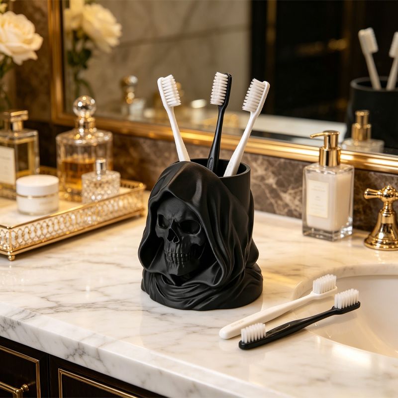 3D-printed hooded skull organizer, perfect for storing toothbrushes and toothpaste in your bathroom. Black. - Image 2