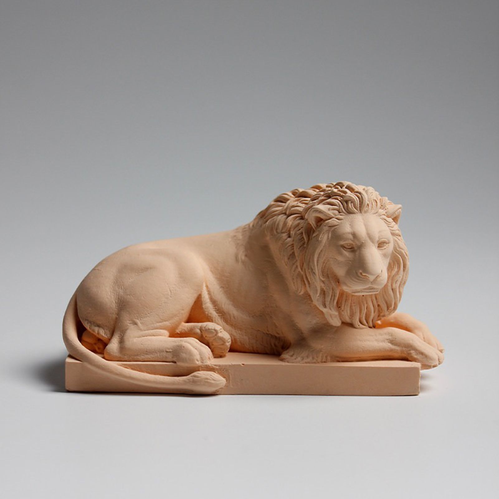 Classic Reclining Lion Sculpture Minimalist Yellow Plaster Desk Ornament for Living Room, Study, or Office Decoration - Image 1