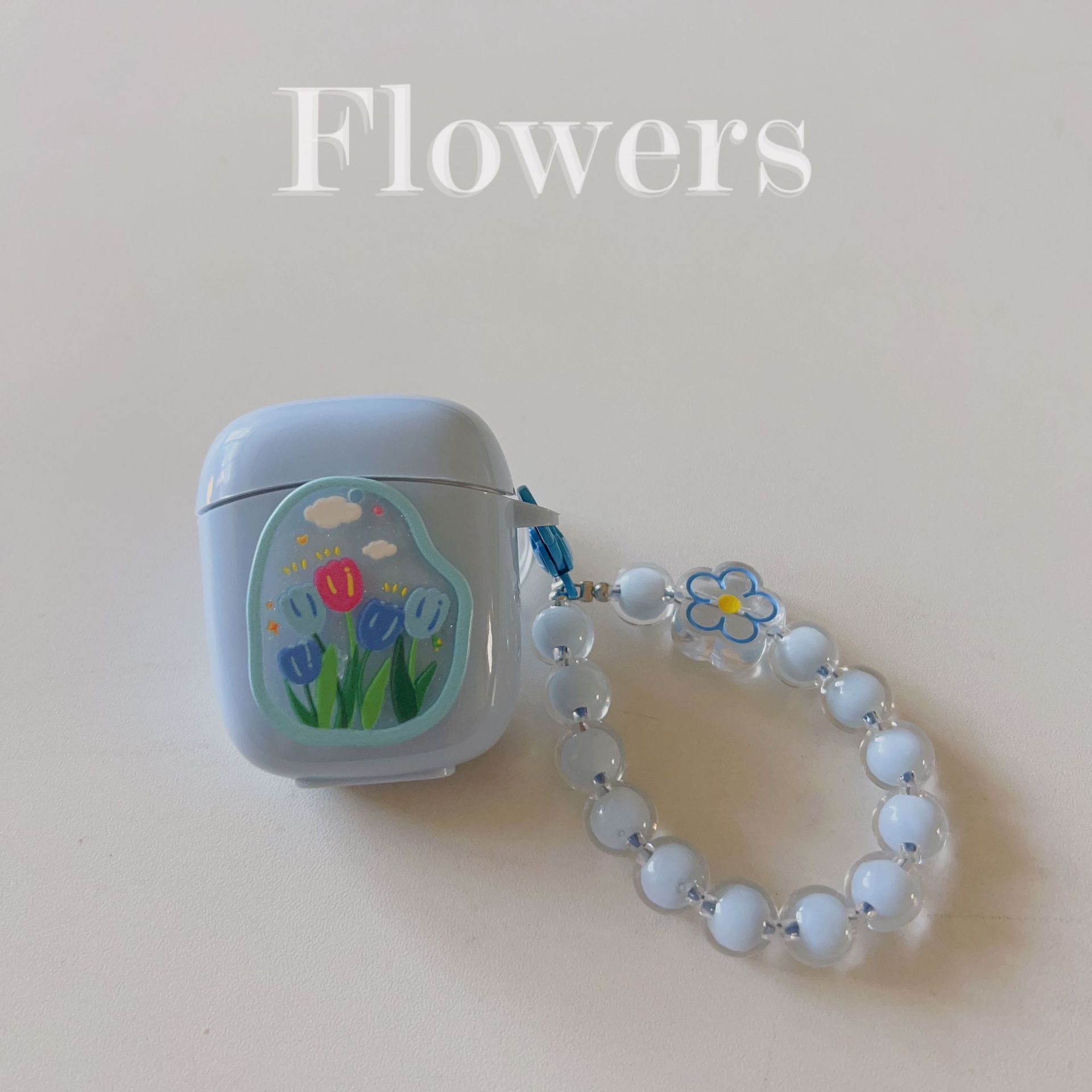Floral patches + light blue base shell + blue bracelet AirPods 1/2 - Image 1