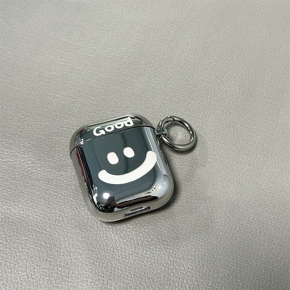 Laser Engraved Smiley with a Ring Apple AirPods 2 - Image 1