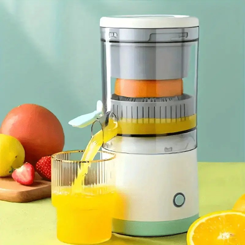 New portable USB juicer, powered by a rechargeable lithium battery, extracts juice from oranges, lemons, watermelons, grapes, and other juicy fruits with the press of a button, efficiently separating pulp residue—a versatile kitchen and travel helper. - Image 1