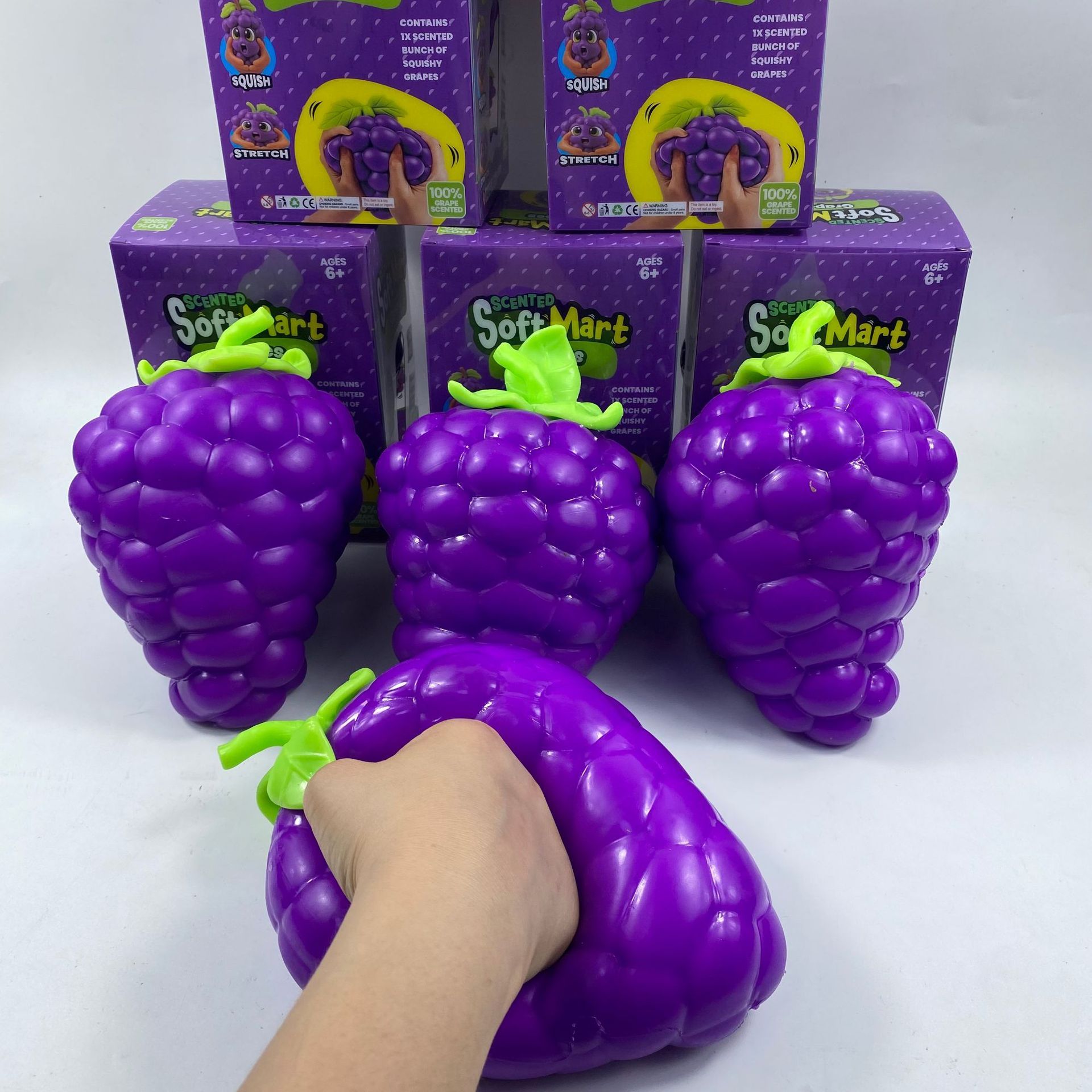 Extra large purple grape squishy toy, realistic and plump TPR soft gel, 19.5cm super size, soft and bouncy for ultimate stress relief, a desktop decompression tool suitable for both adults and children. - Image 1