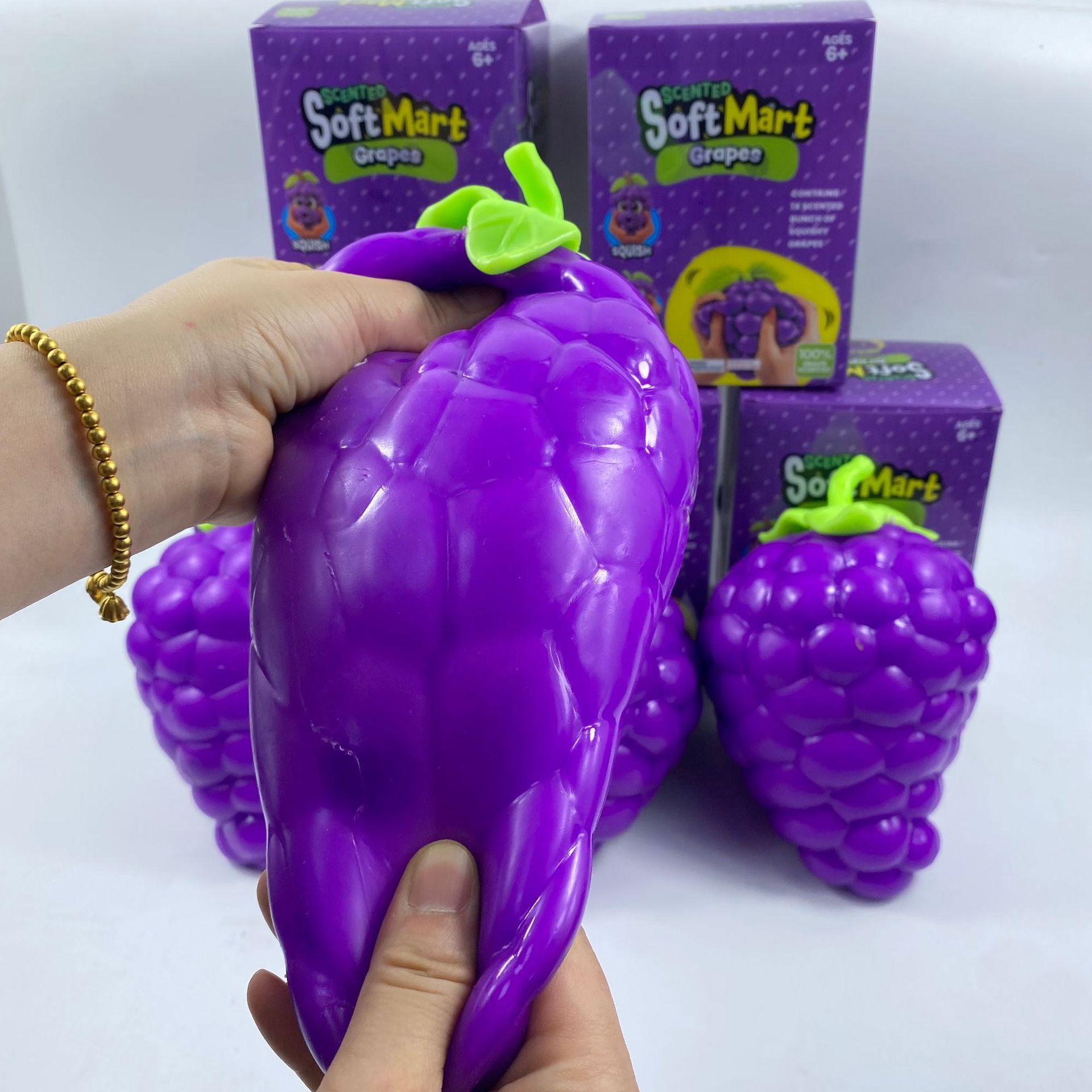 Extra large purple grape squishy toy, realistic and plump TPR soft gel, 19.5cm super size, soft and bouncy for ultimate stress relief, a desktop decompression tool suitable for both adults and children. - Image 4
