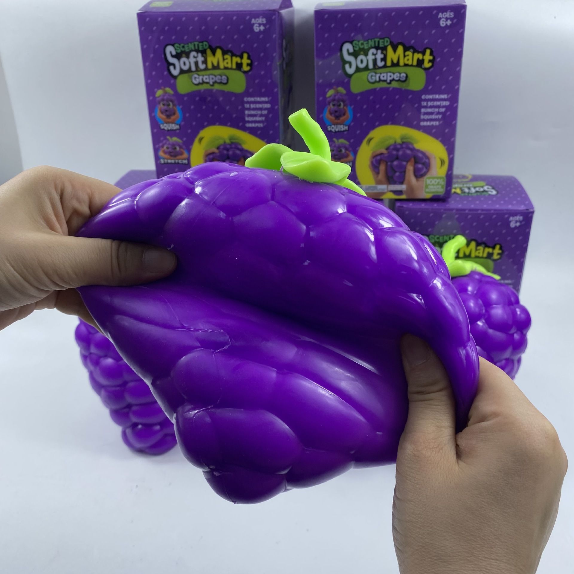 Extra large purple grape squishy toy, realistic and plump TPR soft gel, 19.5cm super size, soft and bouncy for ultimate stress relief, a desktop decompression tool suitable for both adults and children. - Image 5