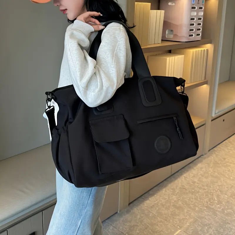 black Large-capacity travel tote bag, lightweight carry-on luggage with shoulder strap, gym bag, portable laptop bag, ideal for short trips, hand-carry style. - Image 1