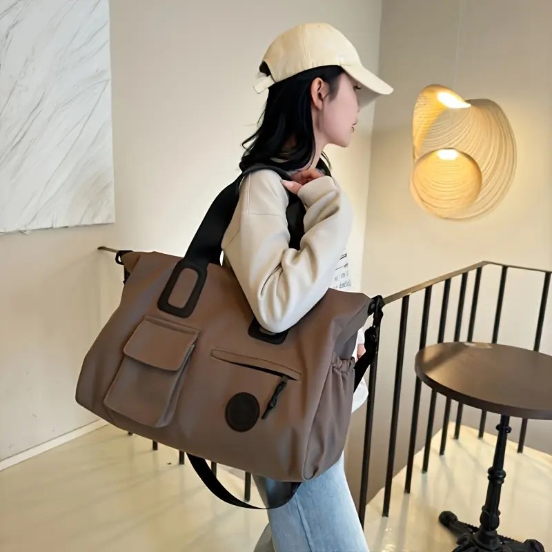 brown Large-capacity travel tote bag, lightweight carry-on luggage with shoulder strap, gym bag, portable laptop bag, ideal for short trips, hand-carry style. - Image 1