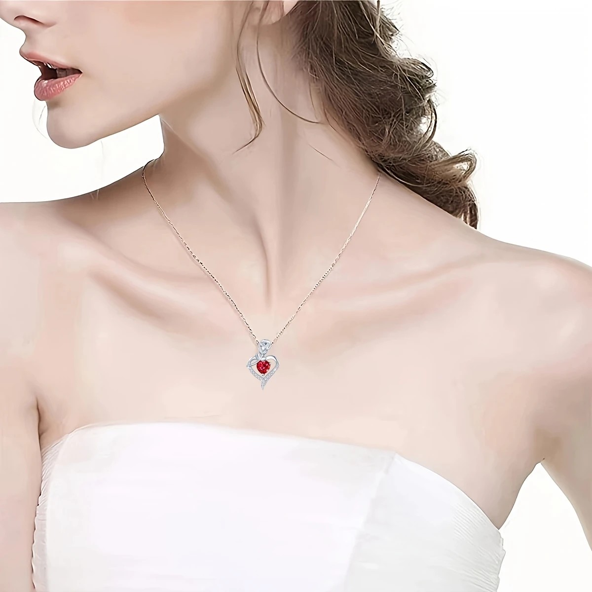 Rose Heart Pendant Necklace, copper-inlaid zirconia with ruby accents, adjustable chain. Symbolizing 