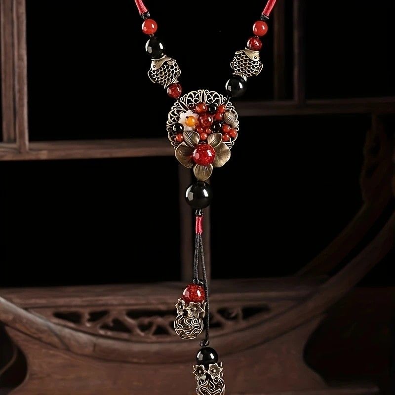 Bohemian style long necklace featuring retro beads and metal carved flowers with elegant dangling tassels adjustable 86cm chain suitable for pairing with sweaters and dresses perfect for daily wear or holiday occasions - Image 1