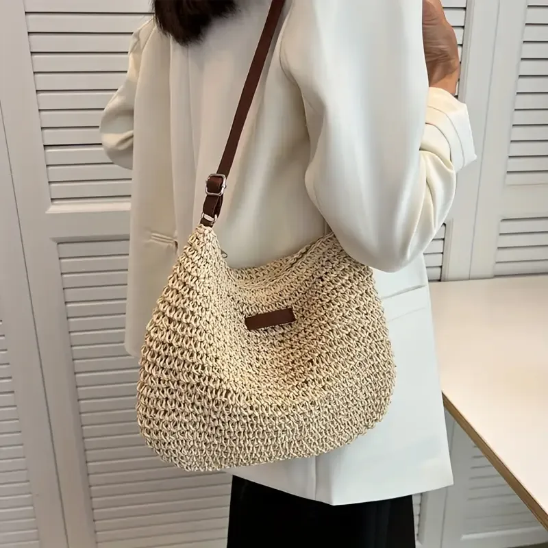 Woven paper straw crossbody bag, hand-crocheted from natural material, vintage bucket shape, lightweight and versatile, perfect for vacations and daily wear./rice - Image 1