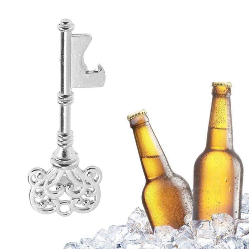 Vintage silver key bottle opener and cap opener - Image 1