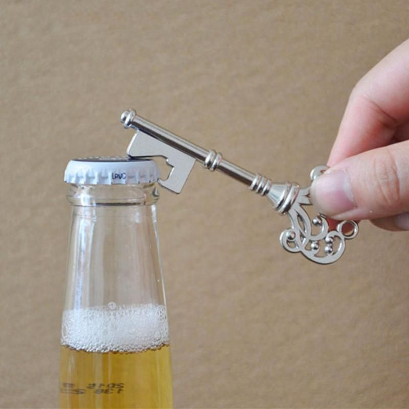 Vintage silver key bottle opener and cap opener - Image 2