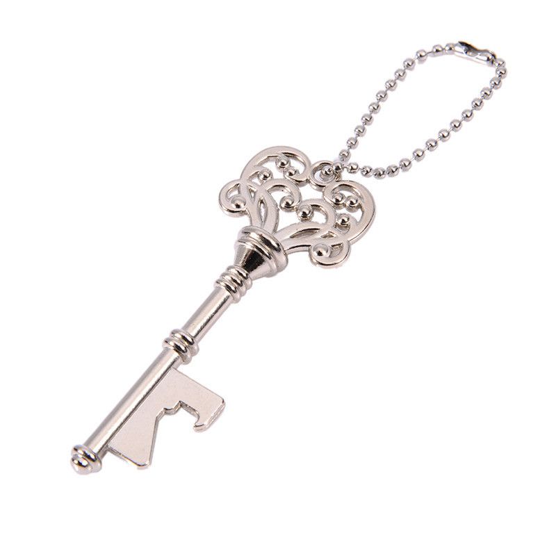 Vintage silver key bottle opener and cap opener - Image 4