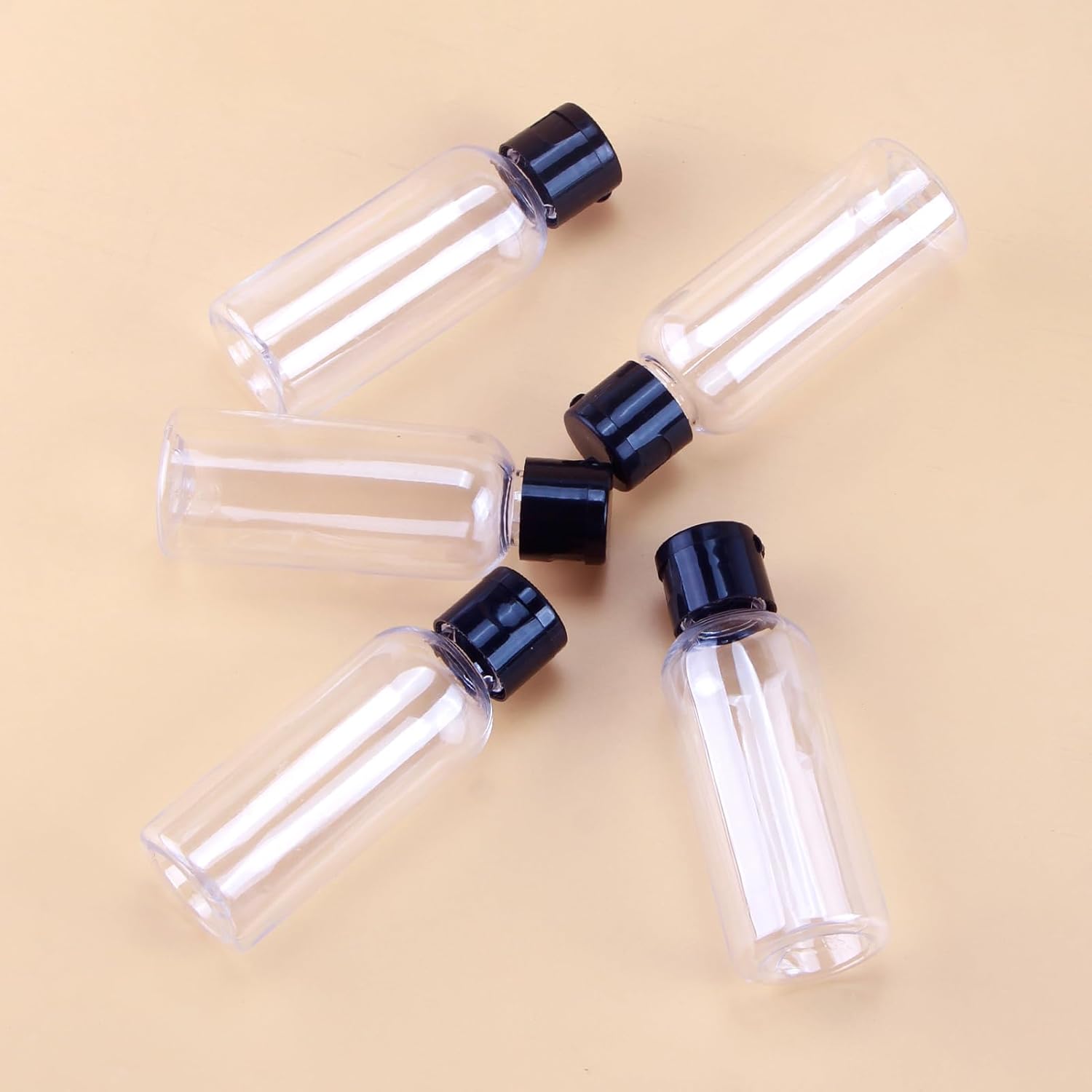 5-piece travel bottle set with flip-cap, 60 ml refillable plastic bottles, empty dispenser for shampoo, travel size, lotion, essential oils, makeup remover, transparent and leak-proof - Image 3