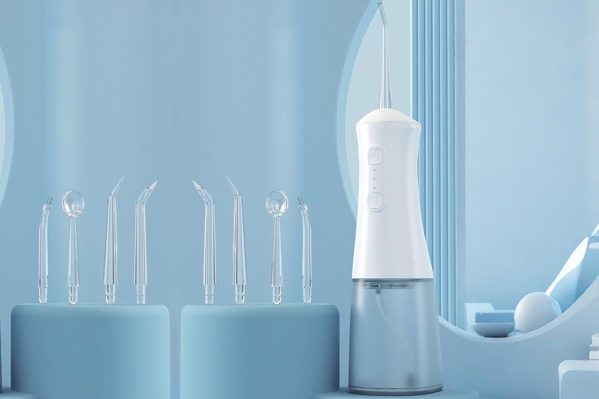 Cordless Rechargeable Portable Water Flosser for Teeth Gums Braces Care and Travel with 8 Flossing Tips - Image 2