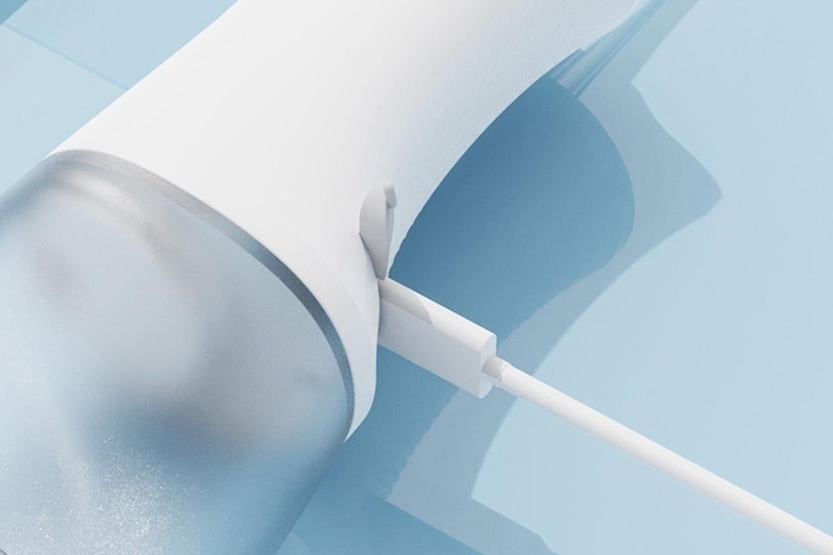 Cordless Rechargeable Portable Water Flosser for Teeth Gums Braces Care and Travel with 8 Flossing Tips - Image 5