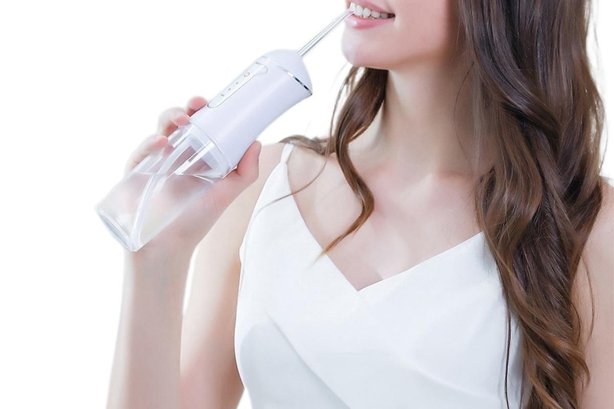 Cordless Portable Electric Water Flosser Teeth Cleaner Floss Irrigator With 4 Jet Tips - White - Image 6