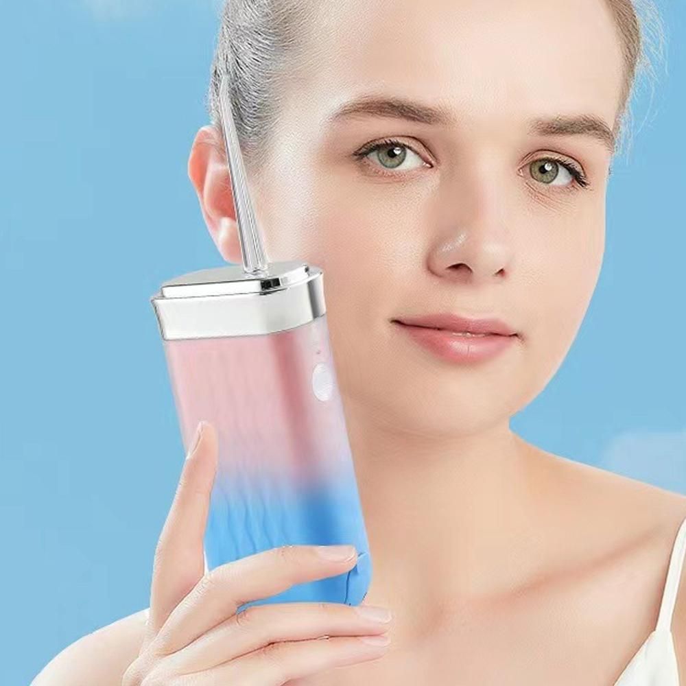 Mini Portable Oral Irrigator Rechargeable Water Dental Flosser With Stretchable Water Tan -Pink - Image 2