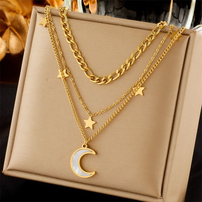 Three-tier layered star-and-moon mother-of-pearl and titanium steel necklace with an 18K gold-plated clasp - Image 2