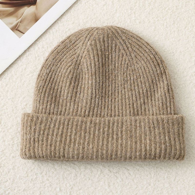 Solid Color Knit Beanie, Unisex Minimal Cuffed Warm Winter Hat with Slim Face Design—Apricot - Image 1