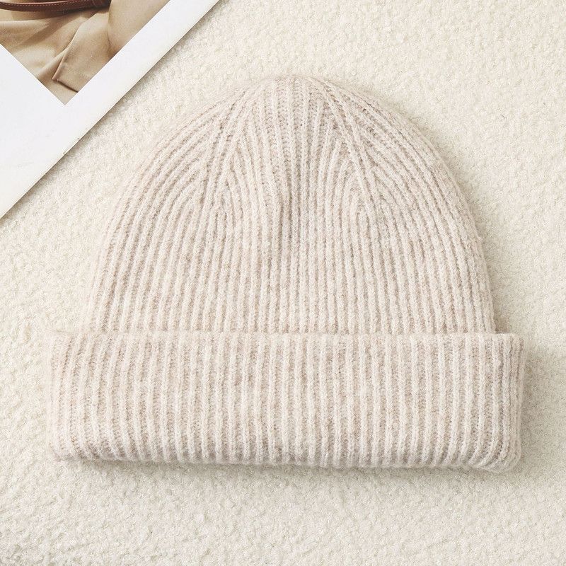 Solid Color Knit Beanie, Unisex Minimal Cuffed Warm Winter Hat with Slim Face Design - Beige - Image 1
