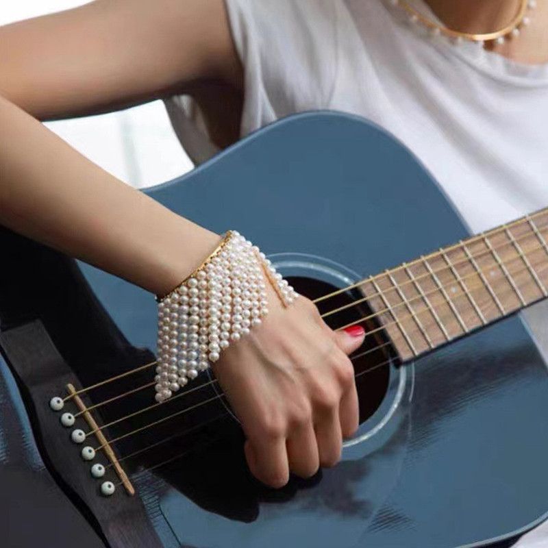 Trendy Pearl Tassel Bracelet – Multi-Layer Chunky Beaded Stretch Wristband for Women, Stylish Glamour Jewelry Gift - Image 1