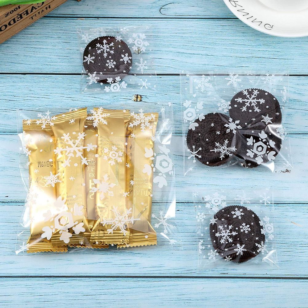 100pcs Christmas Gift Packaging Bag Plastic Packaging Bag Snowfake Printed Candy Package Bag - Image 4
