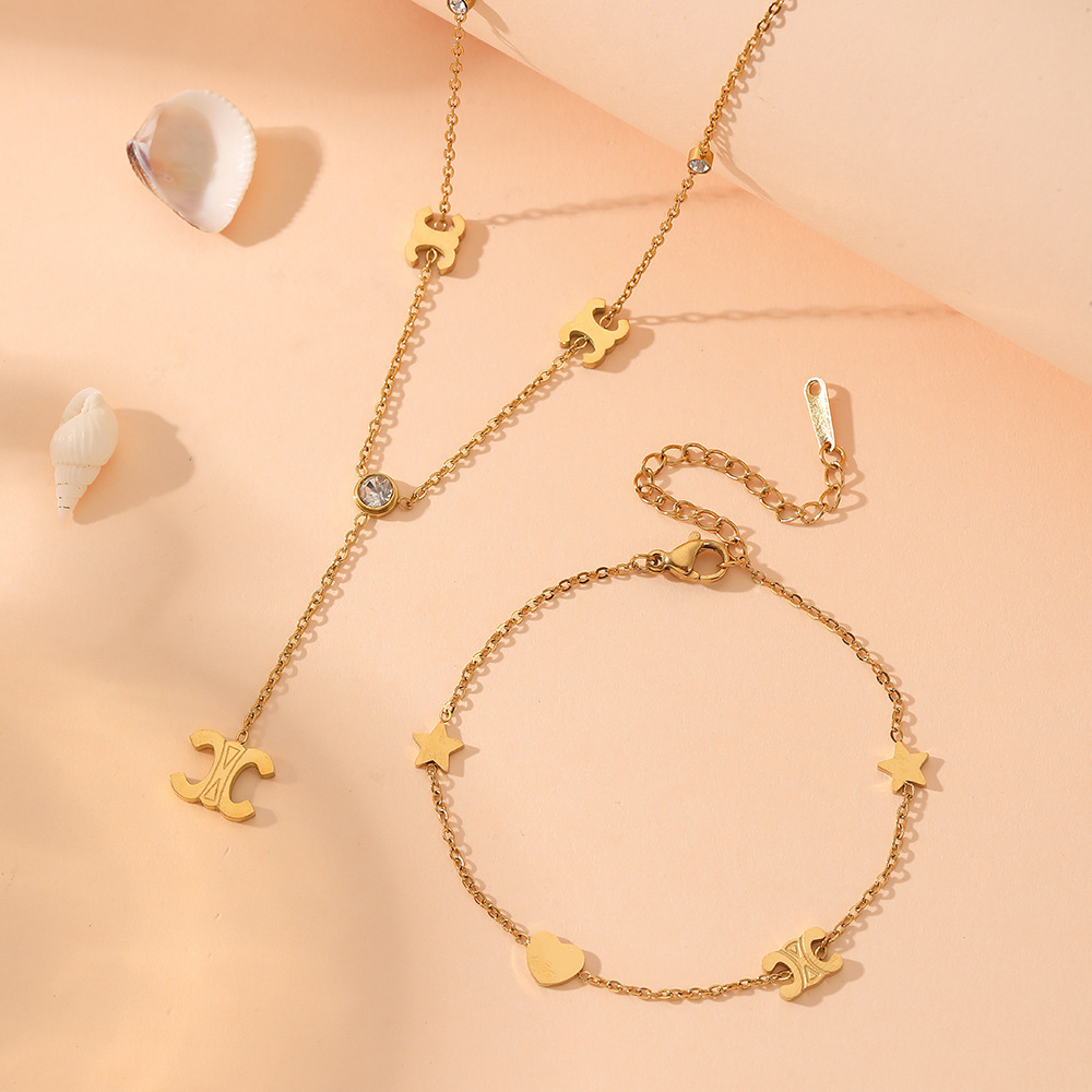 Stylish Stainless Steel Jewelry Set – Elegance Meets Durability with Parisian Arc de Triomphe Design - Image 1