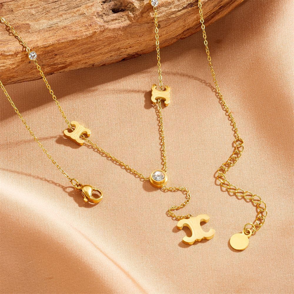 Stylish Stainless Steel Jewelry Set – Elegance Meets Durability with Parisian Arc de Triomphe Design - Image 3
