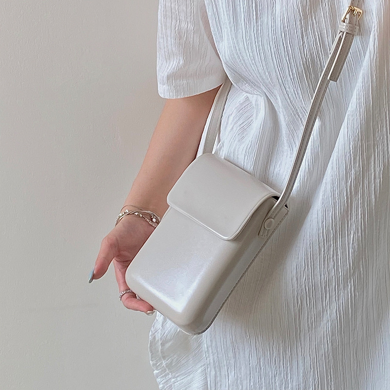 White Stylish Women's Crossbody Phone Bag – Compact Vertical PU Leather Mini Shoulder Bag with Magnetic Closure (Adjustable Strap) - Image 1