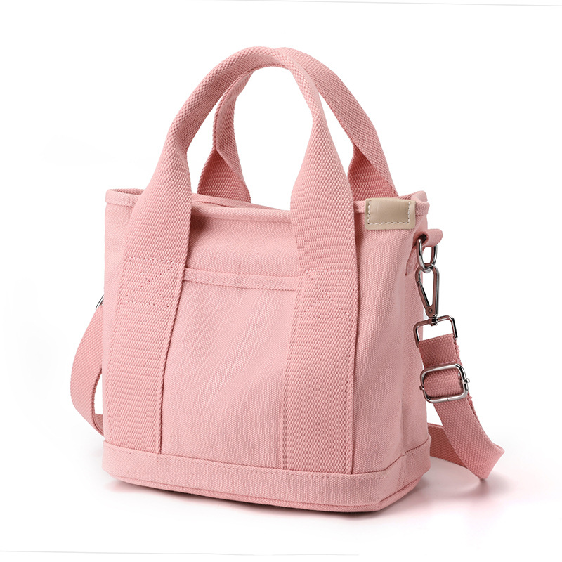 Pink Small Canvas Tote Bag Crossbody Lunch Handbag with Adjustable Strap Fits 9.7 Inch Tablet for Women Daily Work and Travel - Image 1