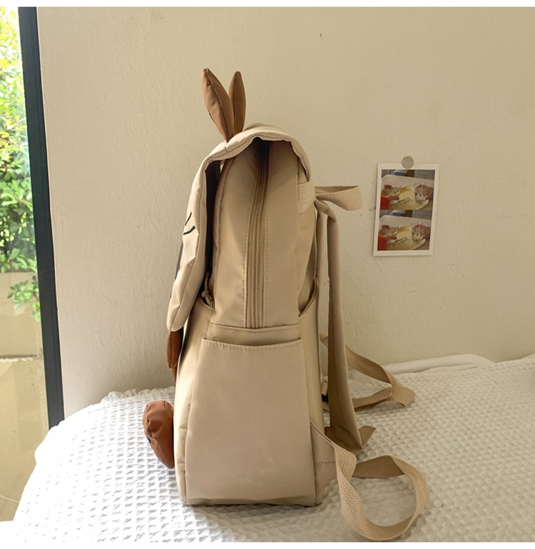 Black Lightweight Nylon Waterproof Schoolbag for Children - Large Capacity Daypack with Ugly-Cute Cat Design - Image 2