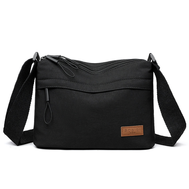 Black Women Lightweight Nylon Crossbody Bag with Multiple Pockets Compact Shoulder Bag for Travel and Daily Essentials in Australia - Image 1