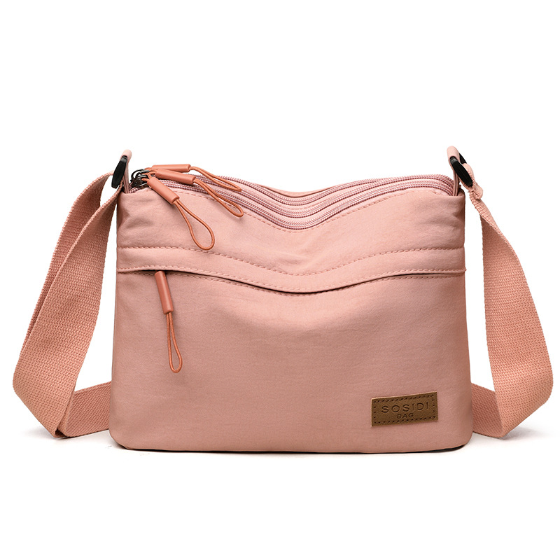 Pink Women Lightweight Nylon Crossbody Bag with Multiple Pockets Compact Shoulder Bag for Travel and Daily Essentials in Australia - Image 1