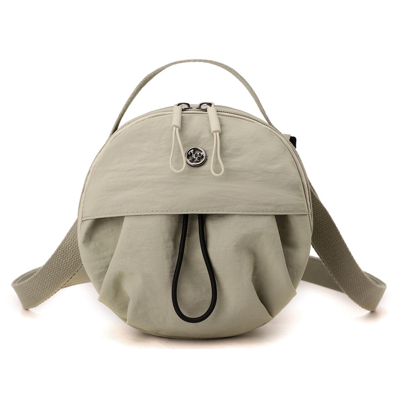 Greyish green Fashionable Round Crossbody Bag with Water-Resistant Nylon and Multi-Pocket Design for Daily Travel Lightweight Hands-Free Storage Solution for Local Professionals - Image 1