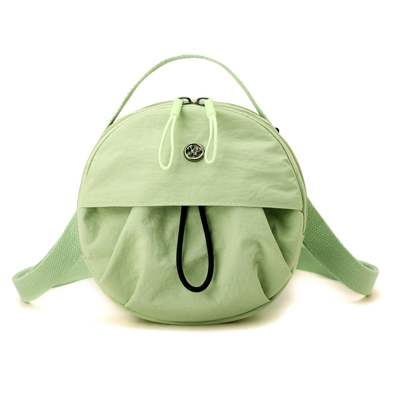 Green lemon Fashionable Round Crossbody Bag with Water-Resistant Nylon and Multi-Pocket Design for Daily Travel Lightweight Hands-Free Storage Solution for Local Professionals - Image 1
