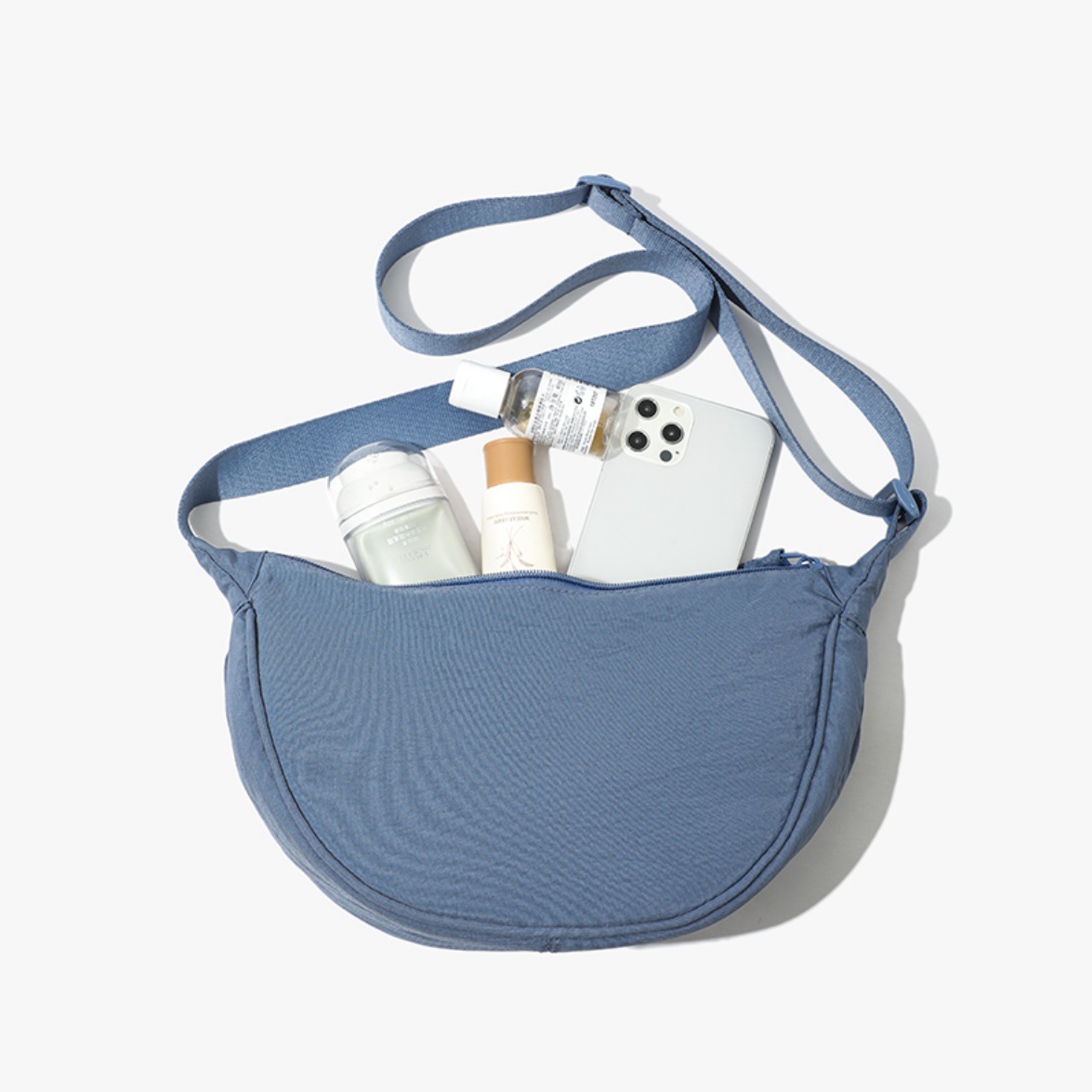 Sea blue Lightweight Nylon Crossbody Bag – Compact Saddle Style with Adjustable Strap for Everyday Use - Image 1