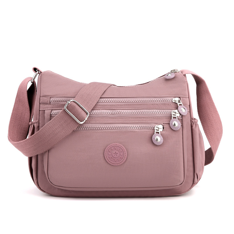 Women's Lightweight Nylon Crossbody Bag Waterproof Multi Pocket Shoulder Purse Travel Messenger Pink - Image 1