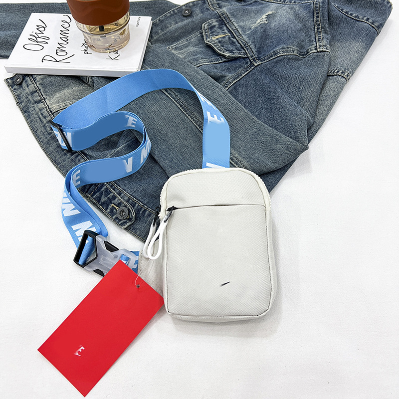Unisex Mini Nylon Crossbody Sling Bag Chest Pouch Adjustable Wide Strap Lightweight Beige for Travel Sports & Festivals - Image 1