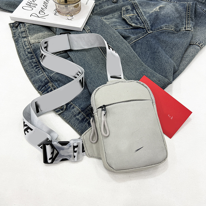 Unisex Mini Nylon Crossbody Sling Bag Chest Pouch Adjustable Wide Strap Lightweight Grey for Travel Sports & Festivals - Image 1