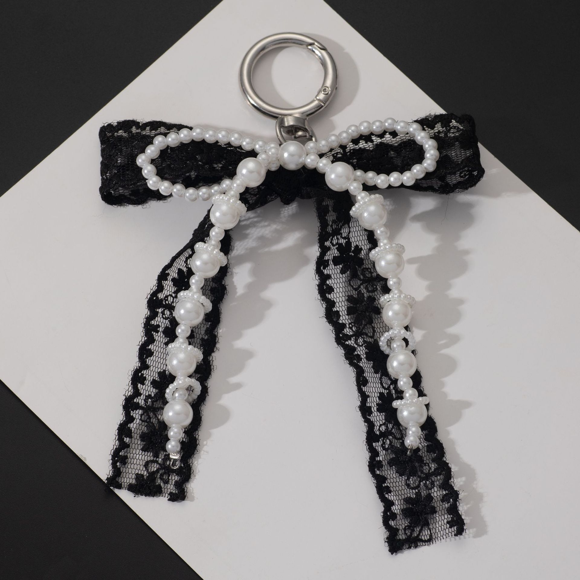 Korean Style Designer Faux Pearl and Fabric Bow Bag Charm Elegant Black Ribbon Bow Keychain for Handbags and Car Keys - Image 1
