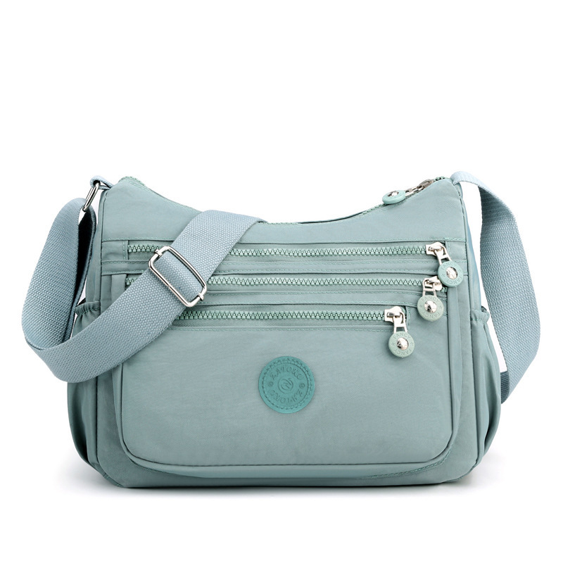Light Blue Versatile Nylon Multi-Pocket Crossbody Bag - Lightweight Casual Travel Purse, Waterproof Horizontal Square Design - Image 1