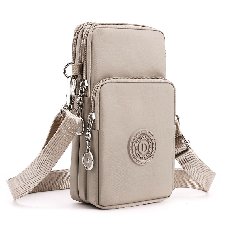 Khaki 3-Layer Waterproof Nylon Vertical Crossbody Phone Bag -  Lightweight Phone Purse with Headphone Jack & Adjustable Strap - Image 1