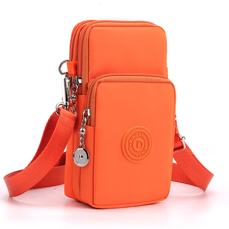 Orange 3-Layer Waterproof Nylon Vertical Crossbody Phone Bag -  Lightweight Phone Purse with Headphone Jack & Adjustable Strap - Image 1