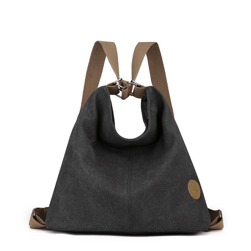 Black Versatile 3-in-1 Canvas Backpack and Shoulder Bag Large Capacity Handbag for Women Ideal for Travel School and Everyday Use - Image 1